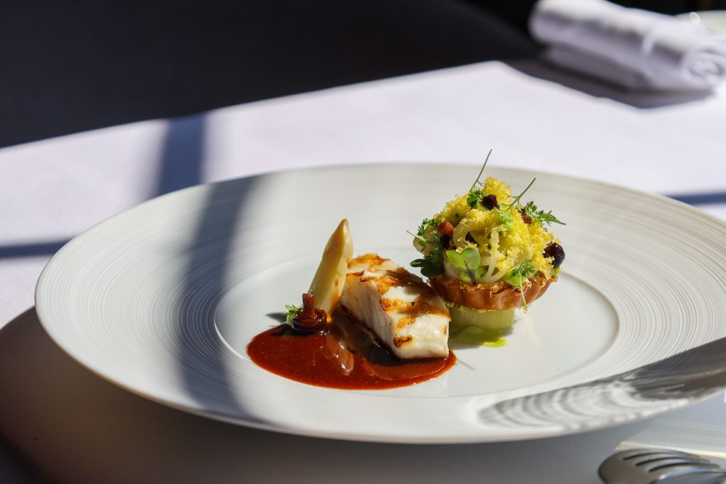 Grilled white fish, white asparagus and a small tart