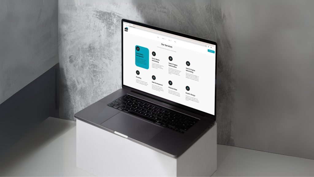 The Our Services page on a laptop